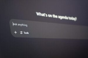Digital interface with "ask anything" prompt.